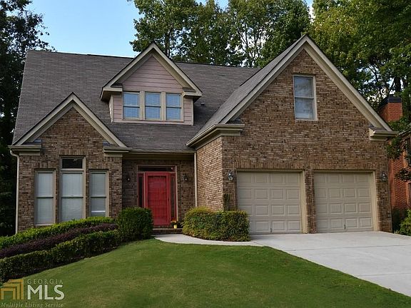 Beautiful 4 sides brick atop a nice rise overlooking the end of the cul-de-sac.  Only 3 blocks from East Atlanta Village!