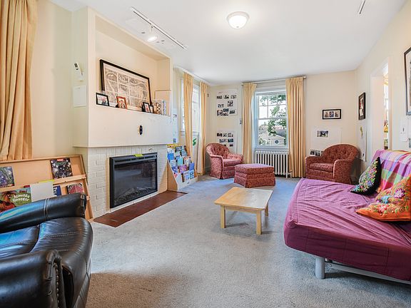 Living room from east wall showing electric fireplace