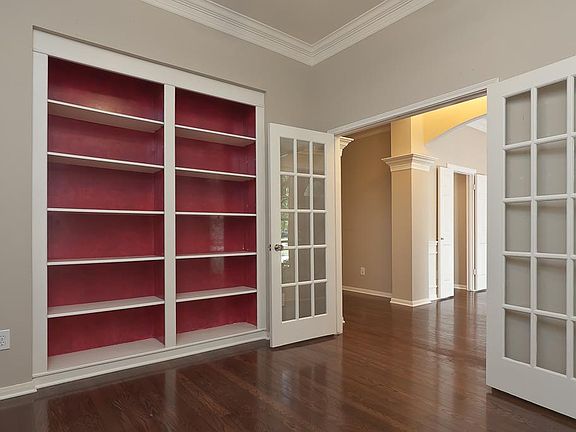 Accessed via French doors, the study is located on the front of the home and includes high ceilings 