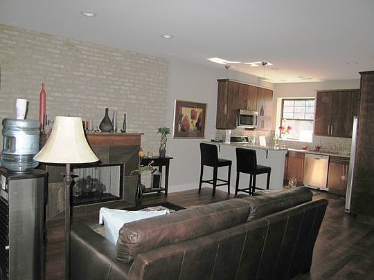 Living room overlooking open kitchen
