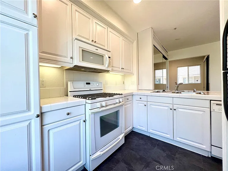 6020 Seabluff Dr #402 — Photo 13