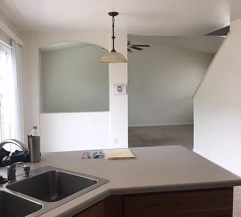 kitchen view to dining and living room