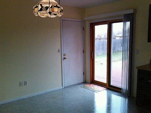 Kitchen with door to back yard and garage