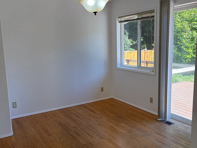 Formal dining room with sliding door to garden