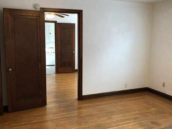 Looking from Living Room through to Dining and Kitchen