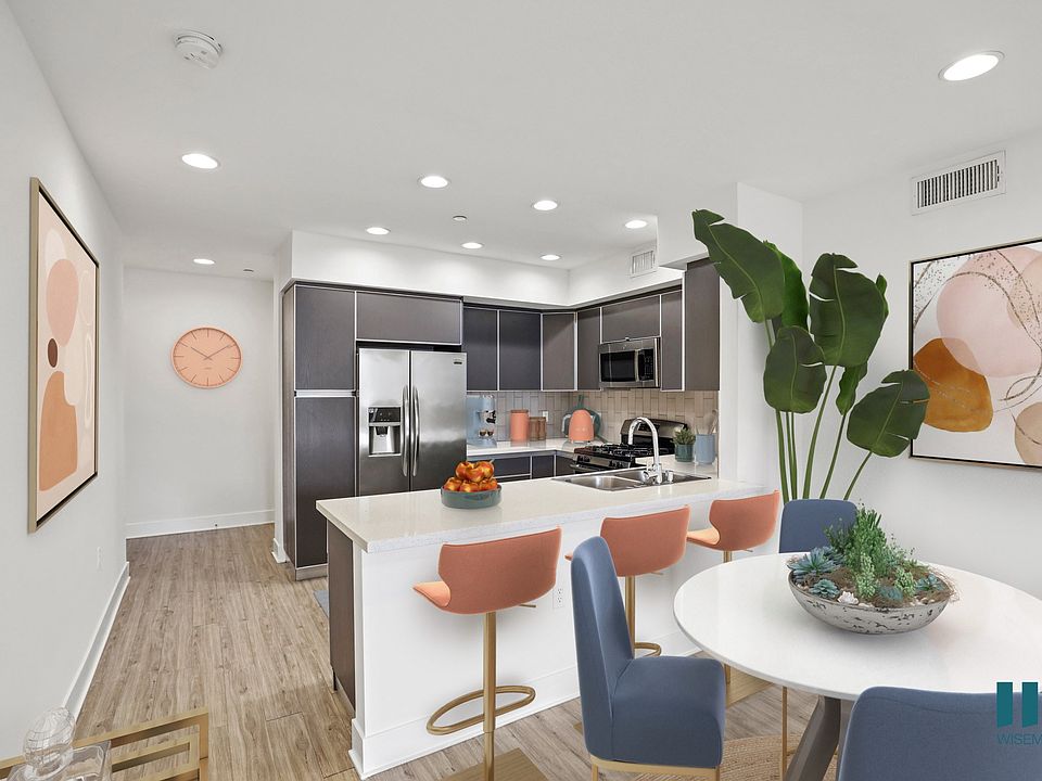 Open-Concept Kitchen with Countertop Bar and Energy-Efficient Appliances