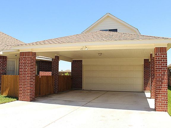 2-car Porte-Cochere at the front of the 2-car Extended Garage