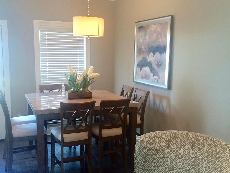 Adjoining dining area with dining table included