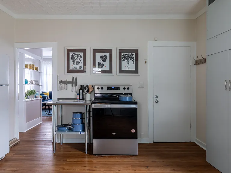 kitchen. Left door to dining/living room. right door to steps to the exit