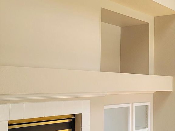 Living Room with gas fireplace and built-ins