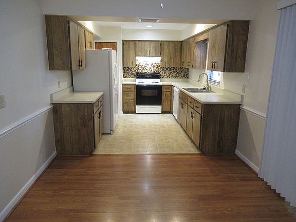 Large Kitchen and sliding glass door to screened patio