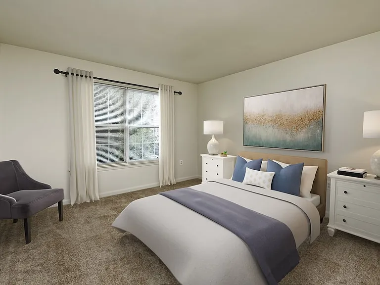 Bedroom with carpeted flooring