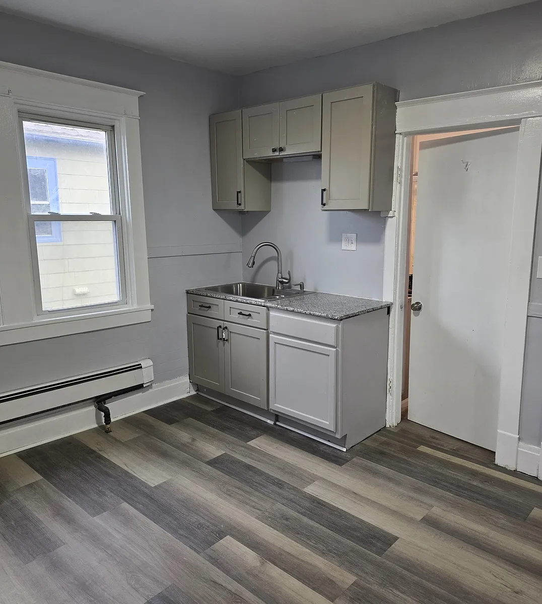 Building Photo - 1377 E Delavan Ave #2