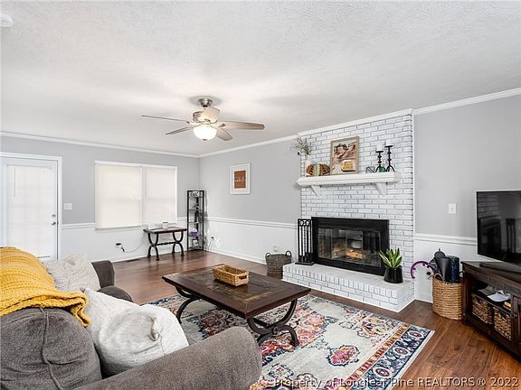 living room with lots of natural light and another door to the backyard