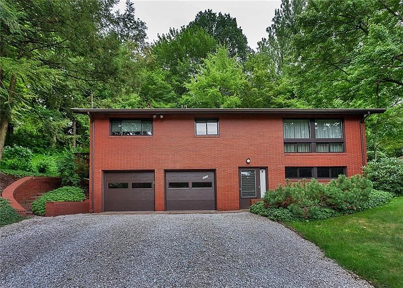 The all brick split entry home offers a unique floor plan with a well maintained and private back yard.