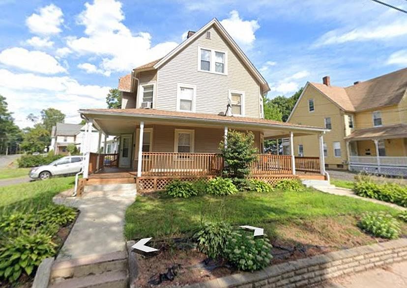 Entrance to house is on right side