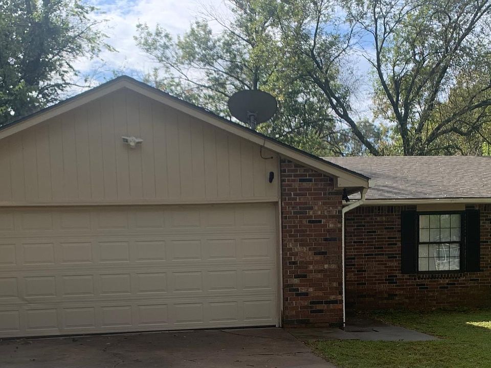 Exterior brick with oversized auto garage