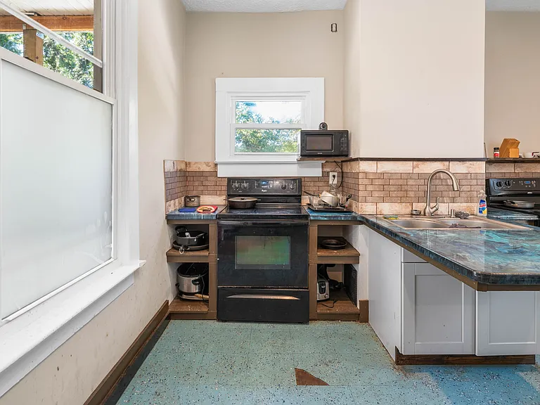 Kitchen with plenty of room to prepare and eat food.