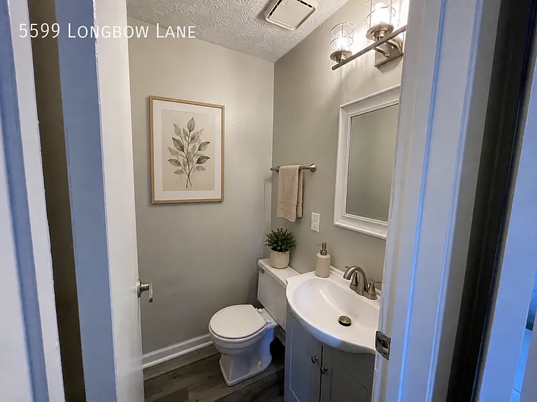 5599 Longbow Ln — Photo 11