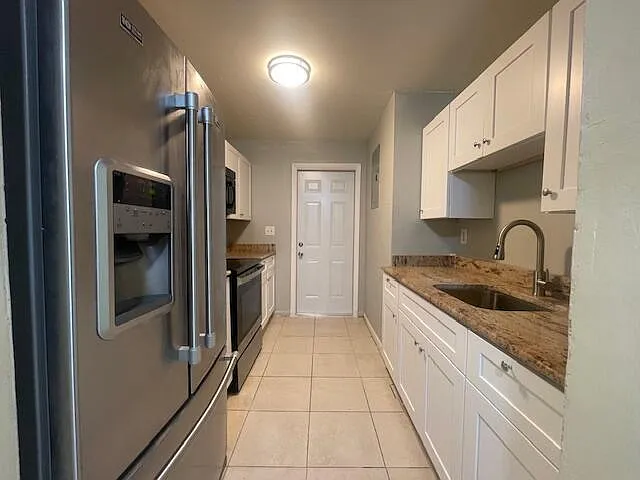 Building Photo - 1525 W 28th St #2