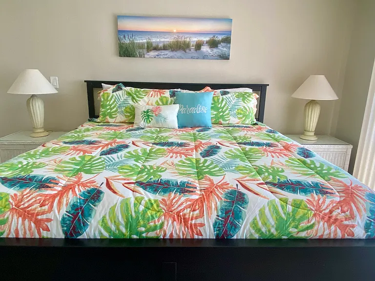 Master bedroom with comfortable king-sized bed
