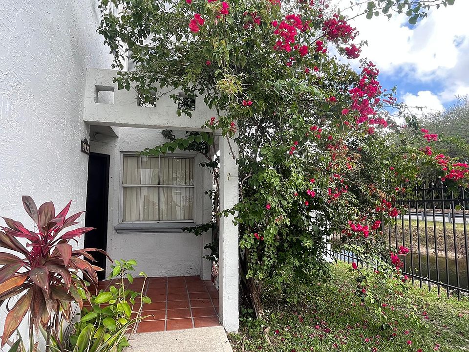 THE BOUGANVILLA AT THE ENTRANCE OF THE APARTMENT. THIS IS A CORNER UNIT, VERY QUIET AND PRIVATE