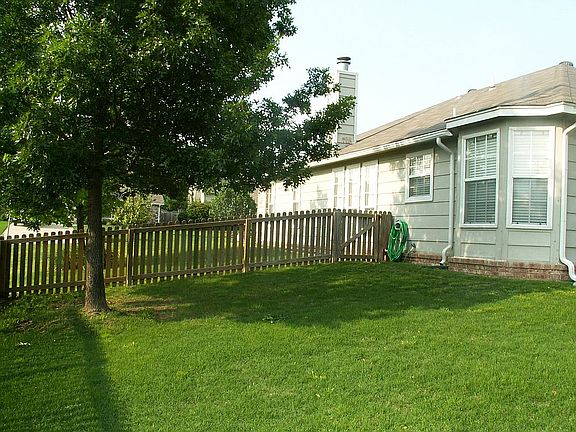 Fully fenced backyard