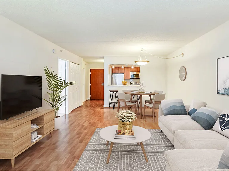 Renovated apartment living area (virtually staged)