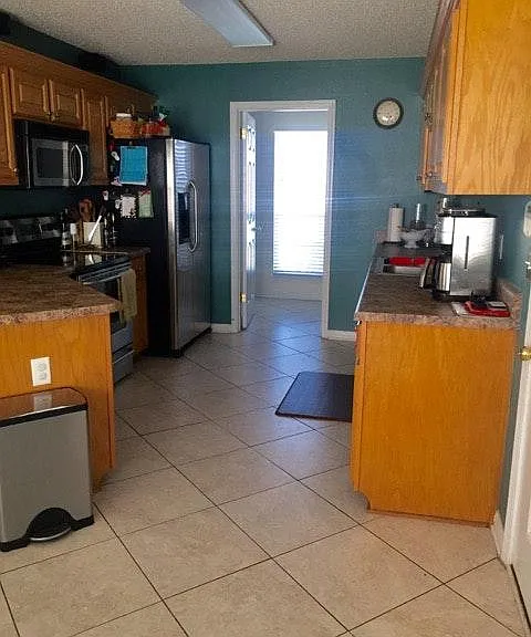 Kitchen- Range, Above Range Microwave, Refrigerator, Dishwas