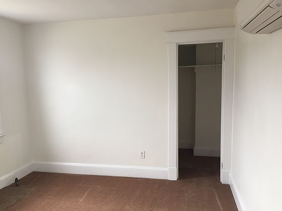bedroom with one of two closets