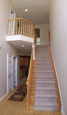 Oak Staircase with Balcony Overlook