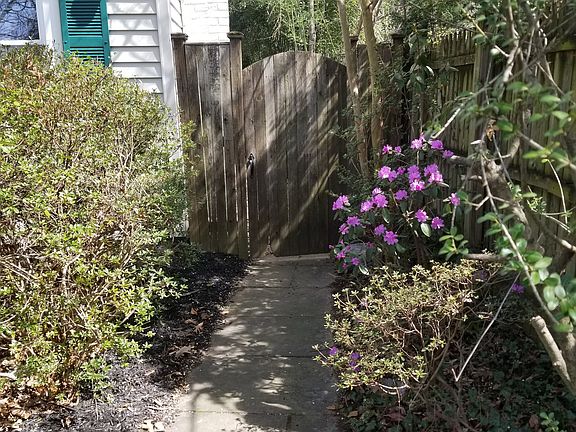 Path to fenced backyard