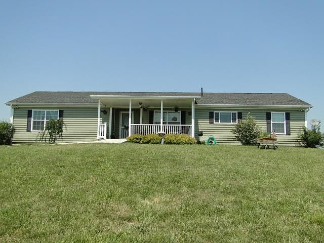 front of house on a beautiful warm day!