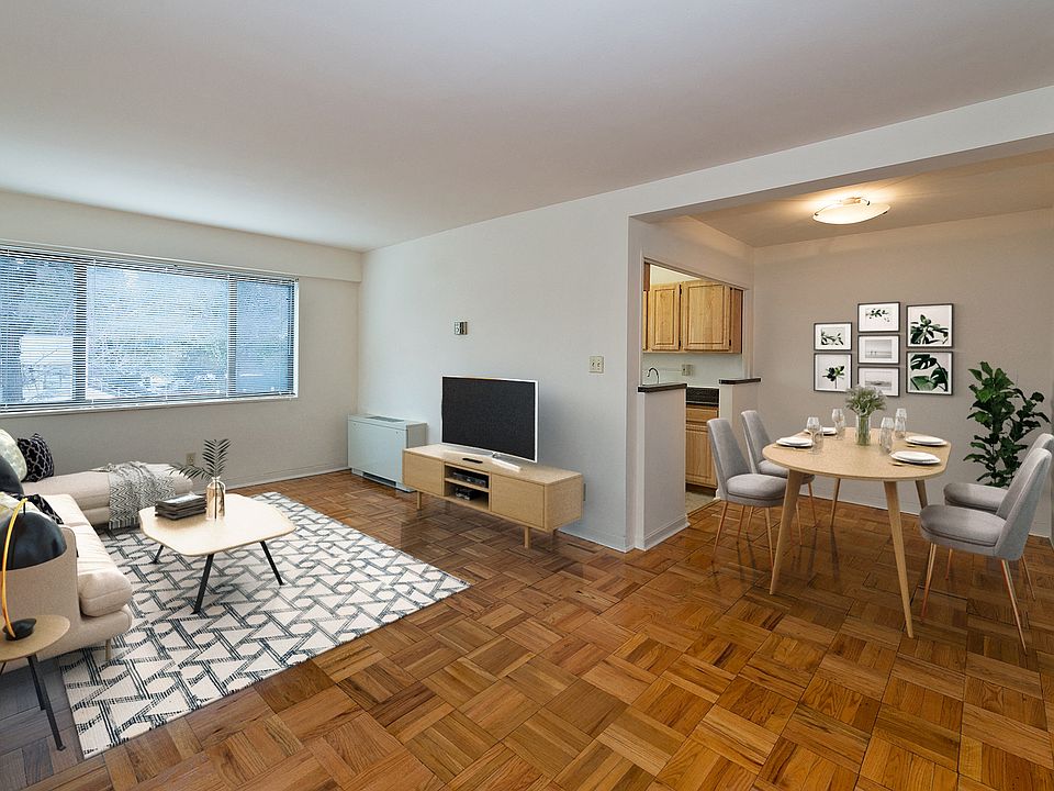 Living and dining area (virtually staged)