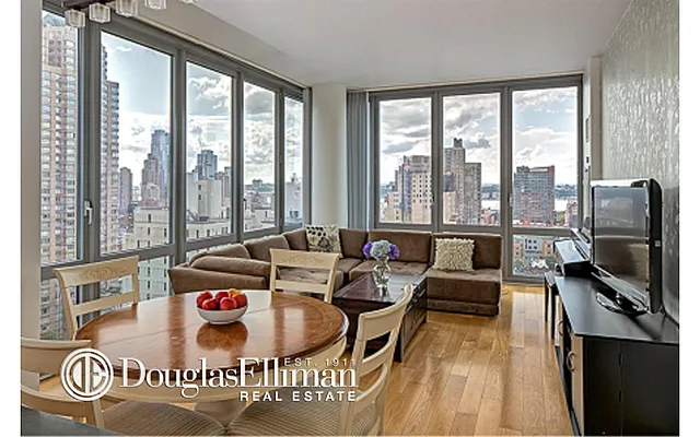 Sold by Douglas Elliman | media 11