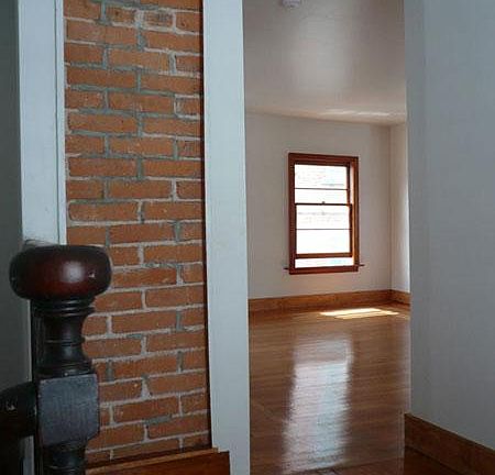 Exposed Brick on Landing to Living Area