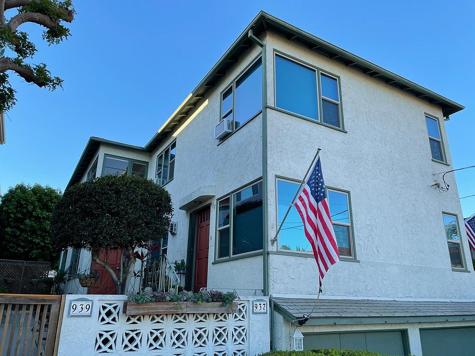 Street view of duplex. Rental is on backside