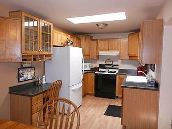 Convenient built-in desk plus all major appliances in a very neat & clean kitchen