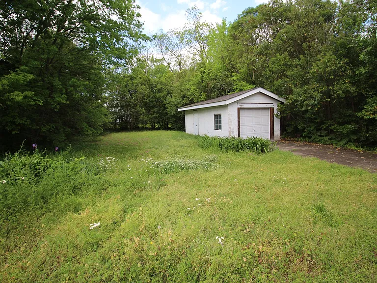 Storage/Garage and Back Yard