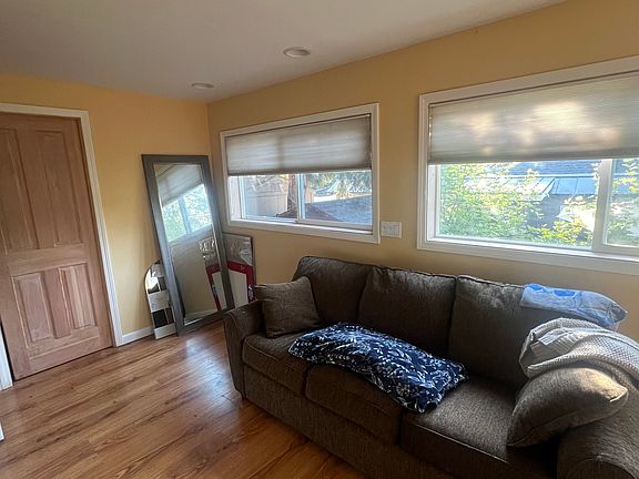 Den with bathroom and laundry