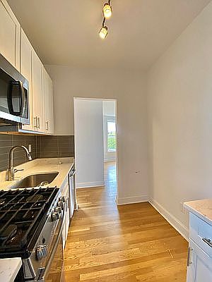5th image of 285 W 4th St APT 8