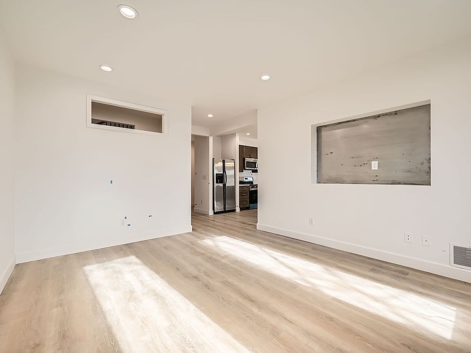 Living room opening to kitchen