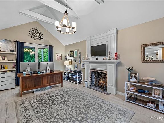 The living room is being used as an office.