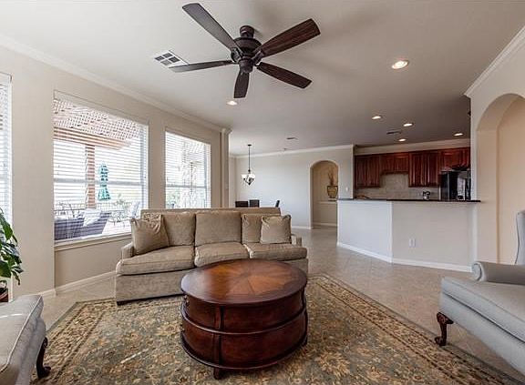 Family room opens to kitchen and breakfast area.