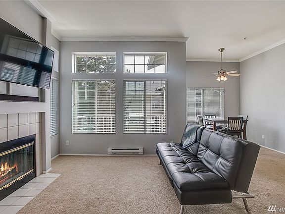 Soaring ceilings and abundant windows create a welcoming and airy space!