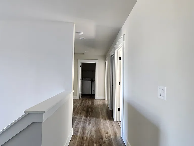 Upstairs landing moving to the bedrooms, laundry and bathroom.