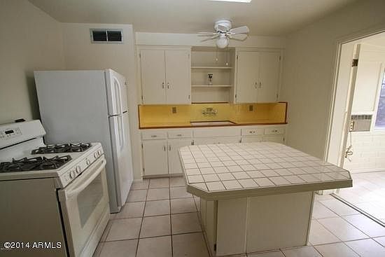 4th image of 11127 W Georgia Ave