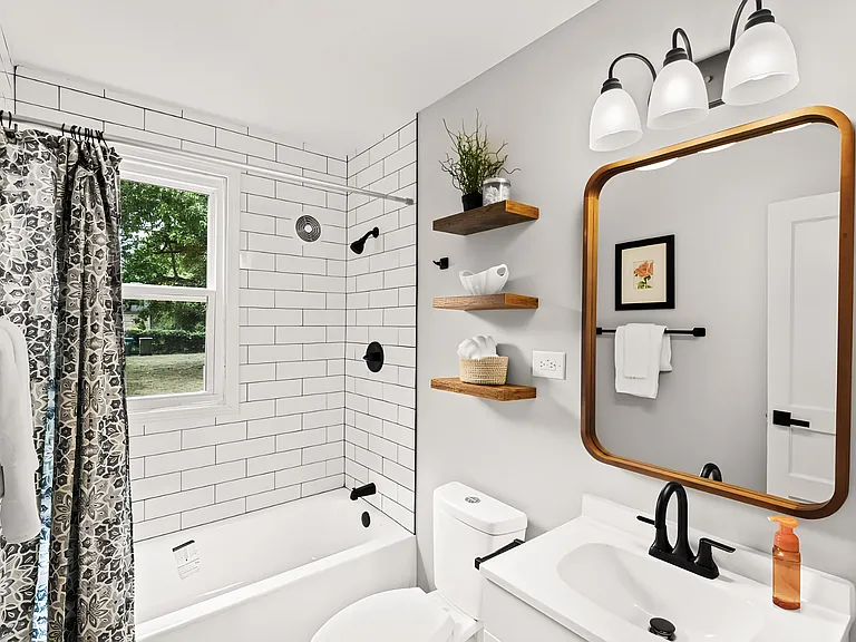 Newly renovated bathroom with brand new tub, sink, toilet and plumbing.