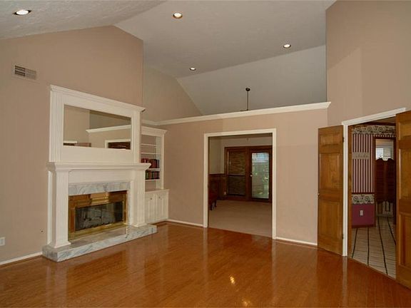 On immediate entry this is the lovely room you encounter.  I call it the den as it has the fireplace; however, it is elegant enough to serve as a formal living room if that suits your taste.