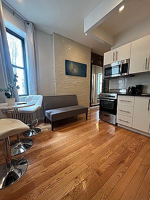 1st image of 521 E 12th St APT 4